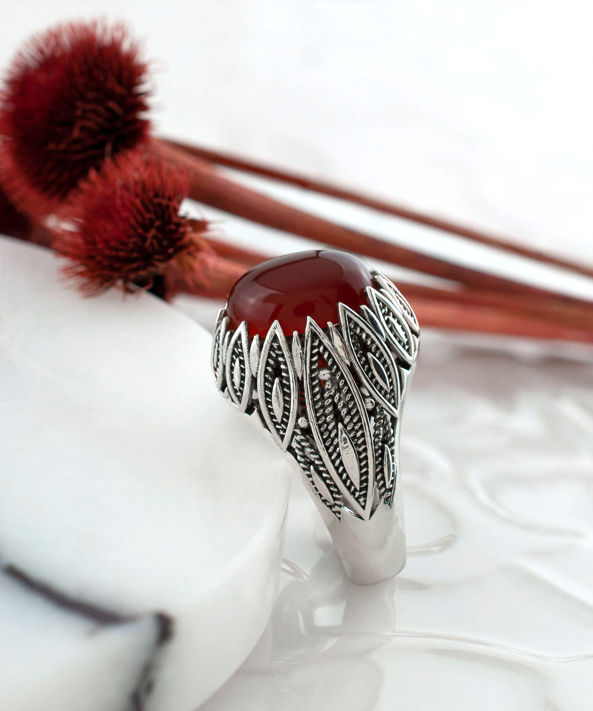 Elegant Filigree Art Carnelian Gemstone Women Silver Statement Ring showcasing intricate metalwork and a vibrant oval-cut Carnelian gemstone.