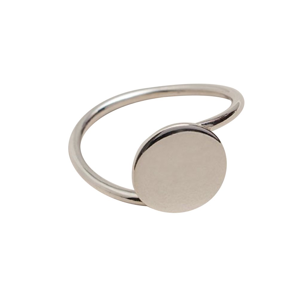 A minimalist Full Moon Ring made of sterling silver, showcasing a smooth, round design that reflects the beauty of the moon.