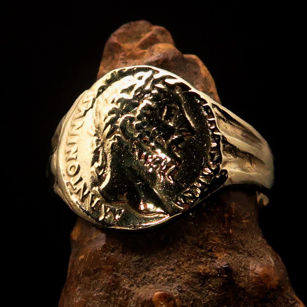 Men's ancient Roman coin ring made of solid brass, featuring a high polished finish and engraved RCRN logo.