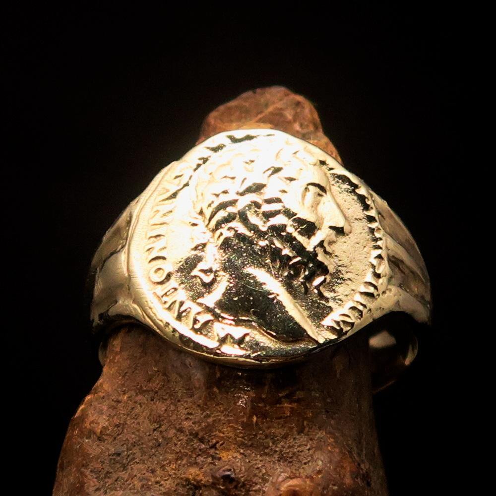 Men's ancient Roman coin ring made of solid brass, featuring a high polished finish and engraved RCRN logo.