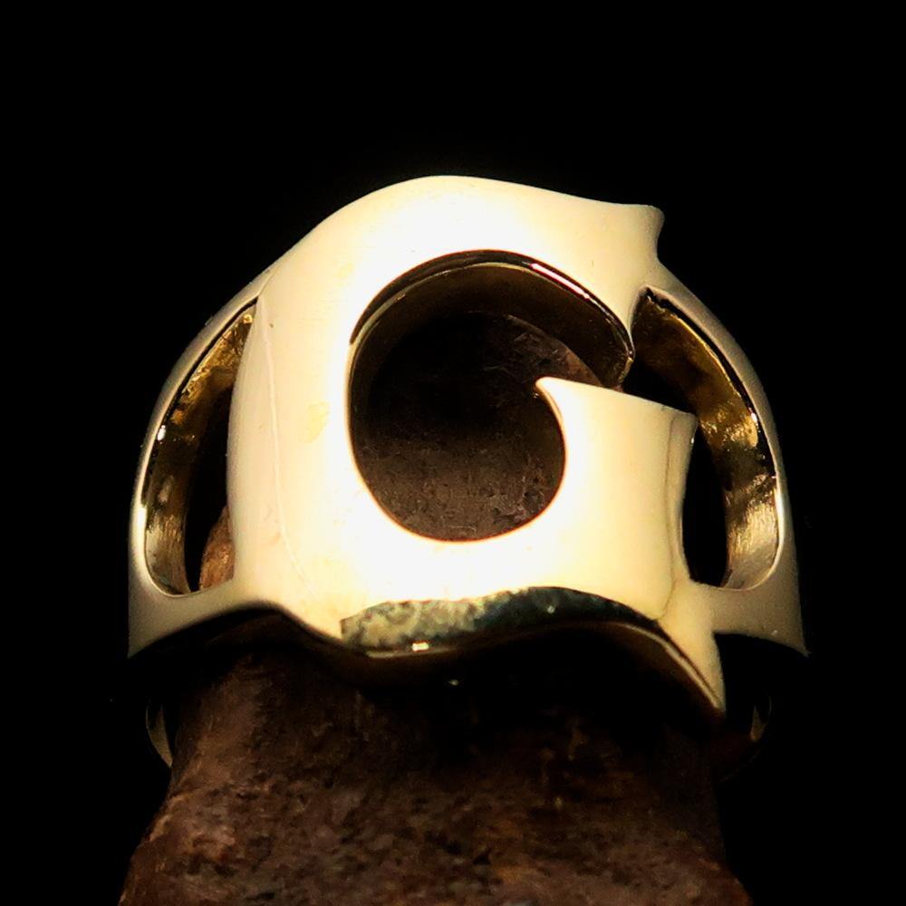 Mirror polished men's brass initial ring featuring a bold letter G, showcasing a sleek and sophisticated design.