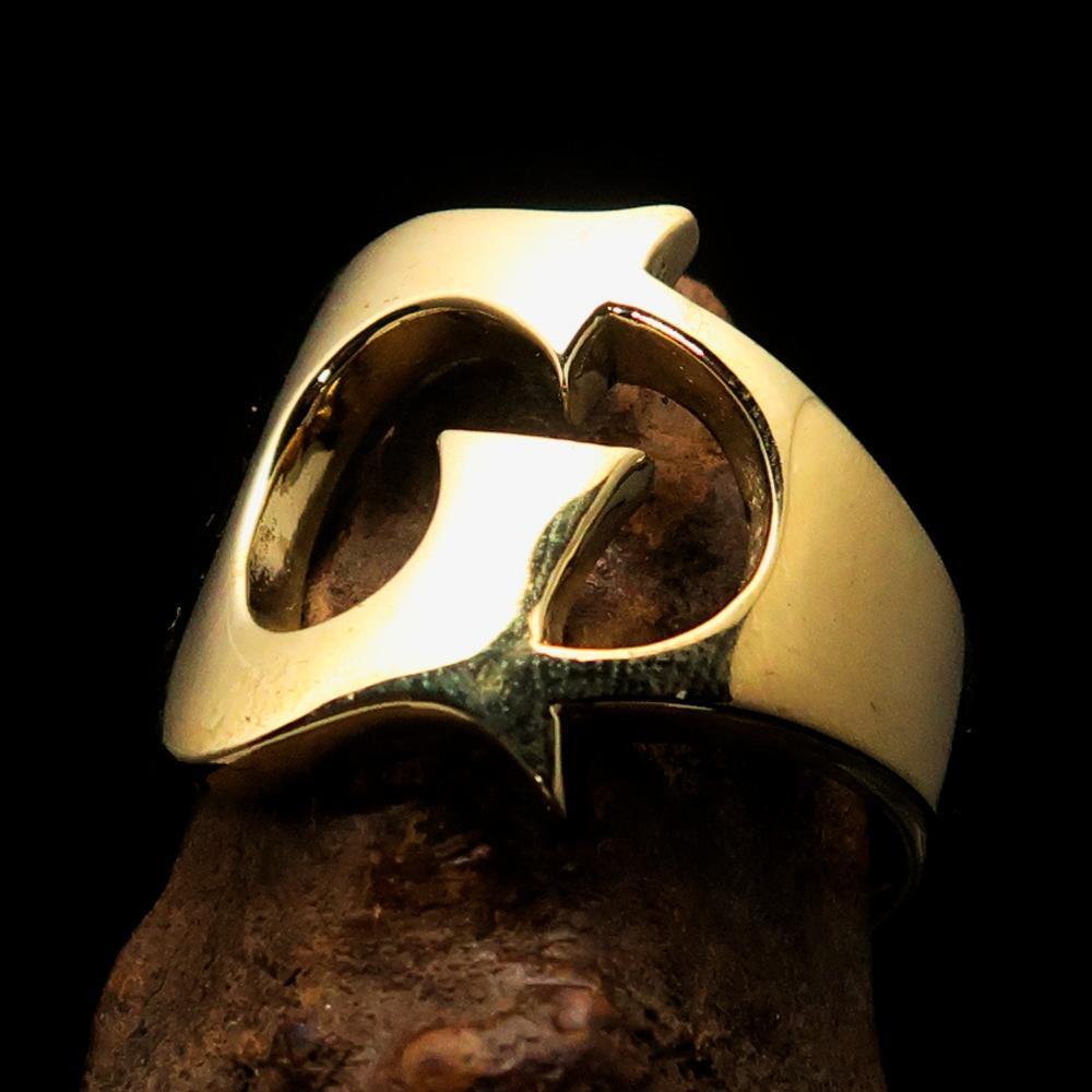 Mirror polished men's brass initial ring featuring a bold letter G, showcasing a sleek and sophisticated design.