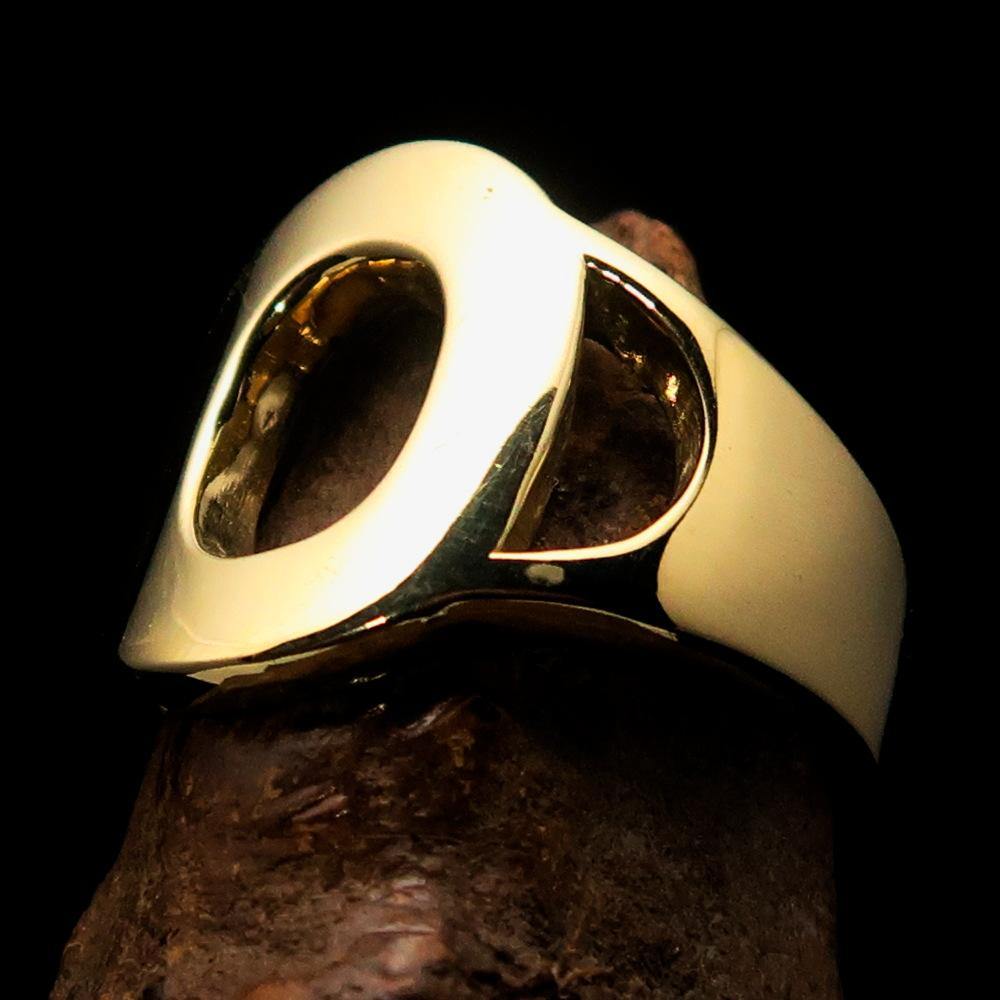 Mirror polished men's brass initial ring featuring a bold letter O, showcasing its sleek design and high shine finish.