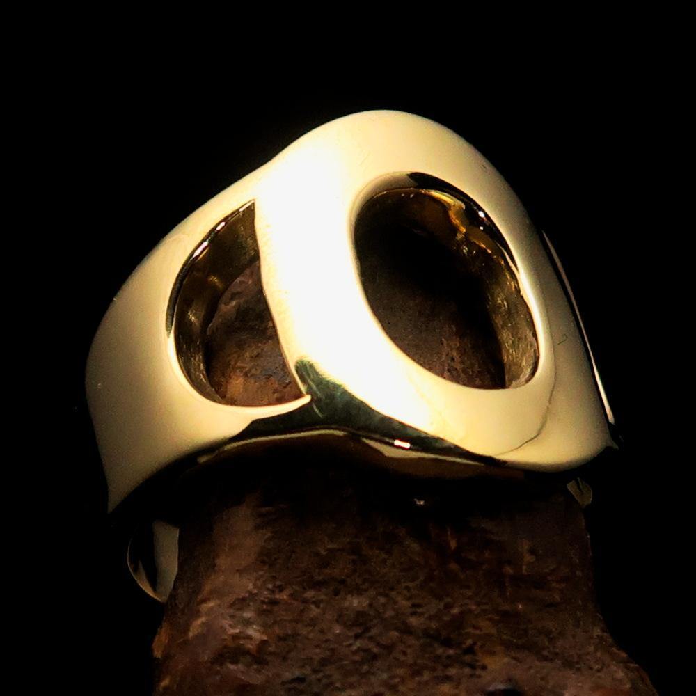 Mirror polished men's brass initial ring featuring a bold letter O, showcasing its sleek design and high shine finish.