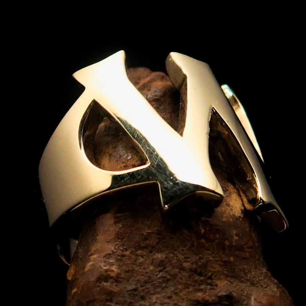 Mirror polished men's brass initial ring with bold letter W, showcasing a sleek and shiny design perfect for stylish men.