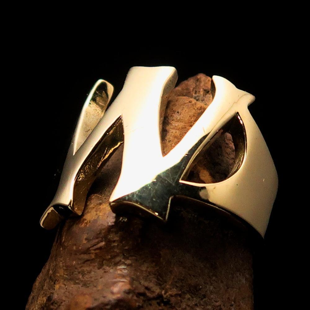 Mirror polished men's brass initial ring with bold letter W, showcasing a sleek and shiny design perfect for stylish men.