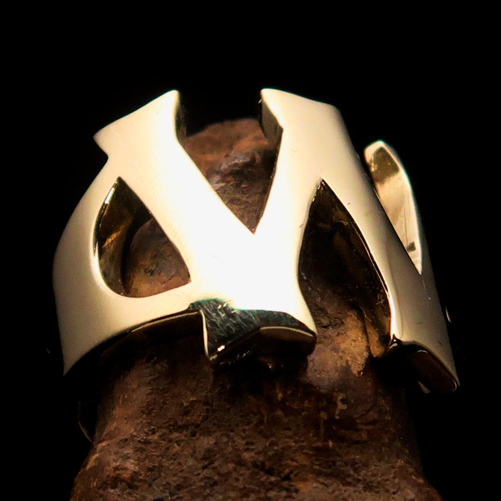 Mirror polished men's brass initial ring with bold letter W, showcasing a sleek and shiny design perfect for stylish men.