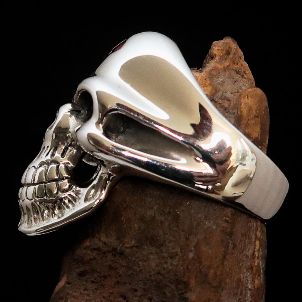 Mirror polished Men's Sterling Silver Outlaw Biker Ring featuring a skull design with red enamel accents, showcasing its high-quality craftsmanship.