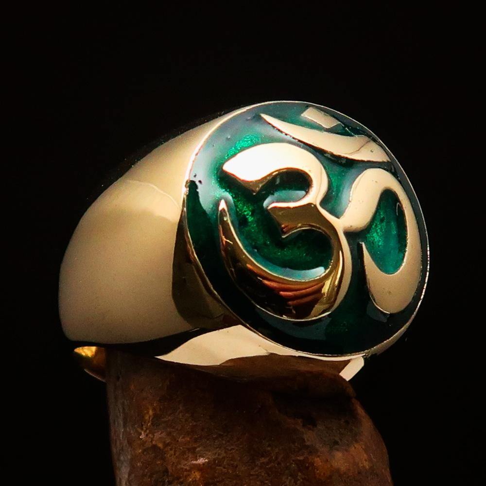 Solid brass Men's Buddhist Ring with a green Aum symbol, featuring high polish and enamel detailing.