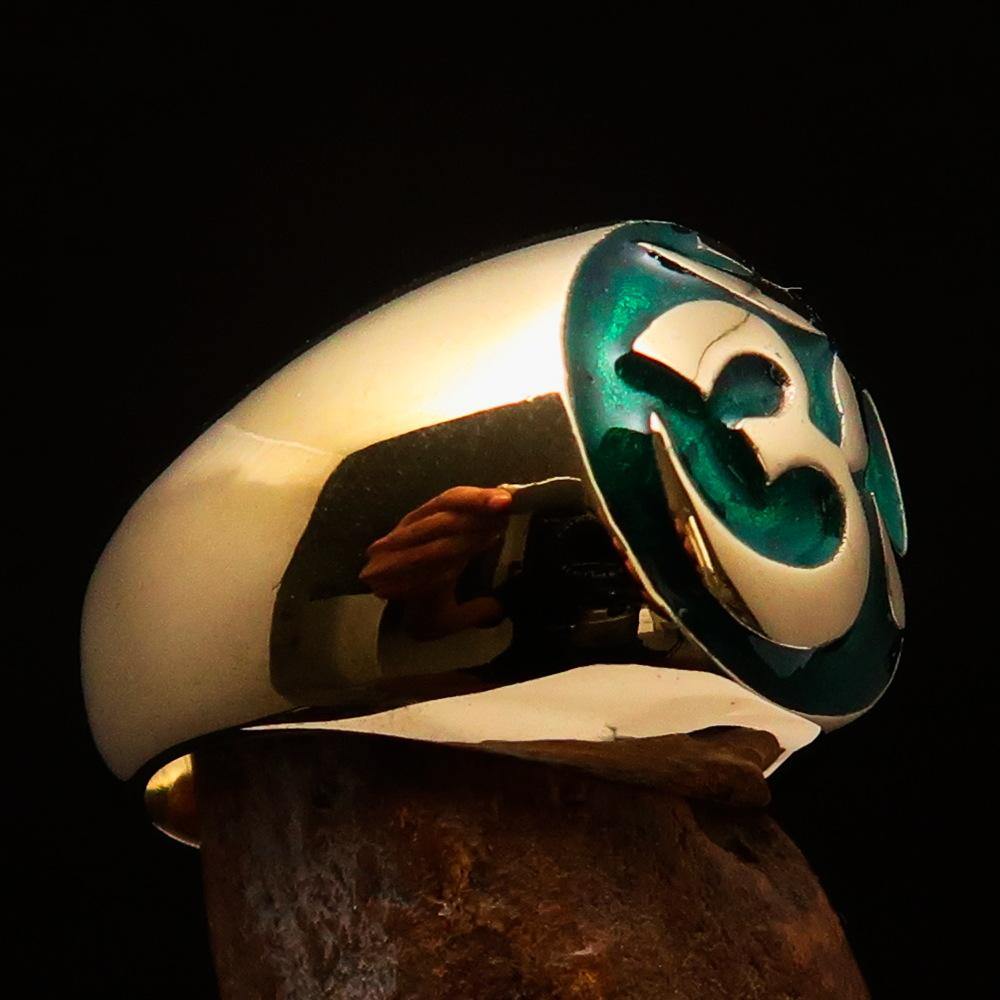 Solid brass Men's Buddhist Ring with a green Aum symbol, featuring high polish and enamel detailing.