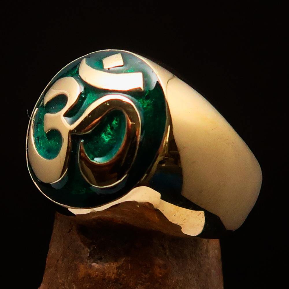 Solid brass Men's Buddhist Ring with a green Aum symbol, featuring high polish and enamel detailing.