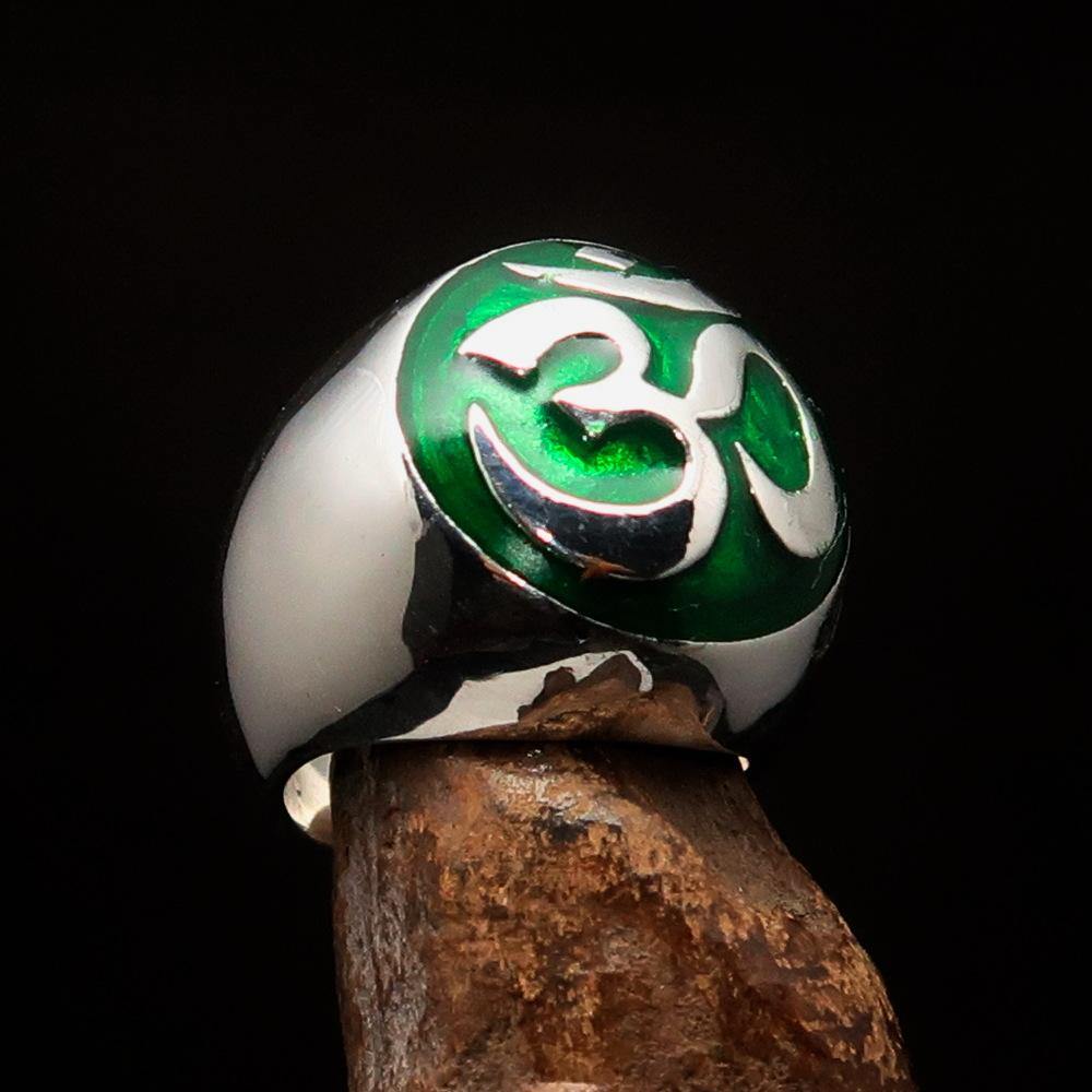 Men's Buddhist Ring made of sterling silver featuring a green Aum symbol, high polished with enamel finish.