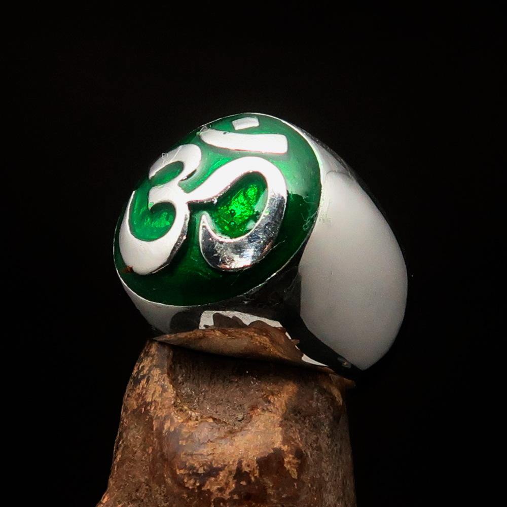 Men's Buddhist Ring made of sterling silver featuring a green Aum symbol, high polished with enamel finish.