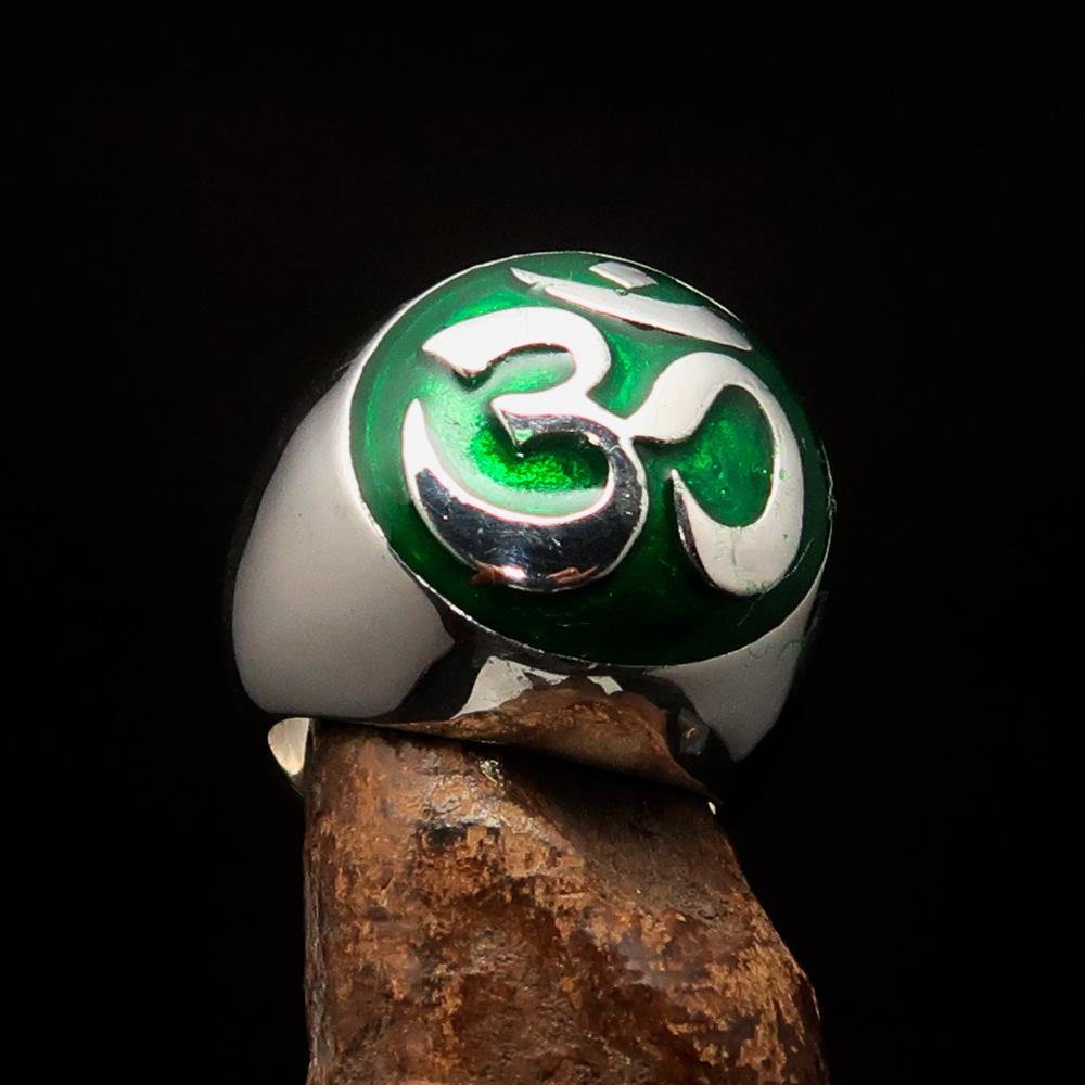 Men's Buddhist Ring made of sterling silver featuring a green Aum symbol, high polished with enamel finish.