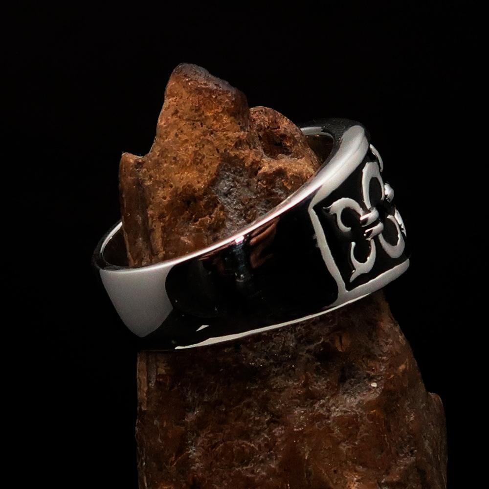 Men's Fleur de Lis Ring in black sterling silver with high polish and enamel finish, showcasing the intricate design and hallmark 925.