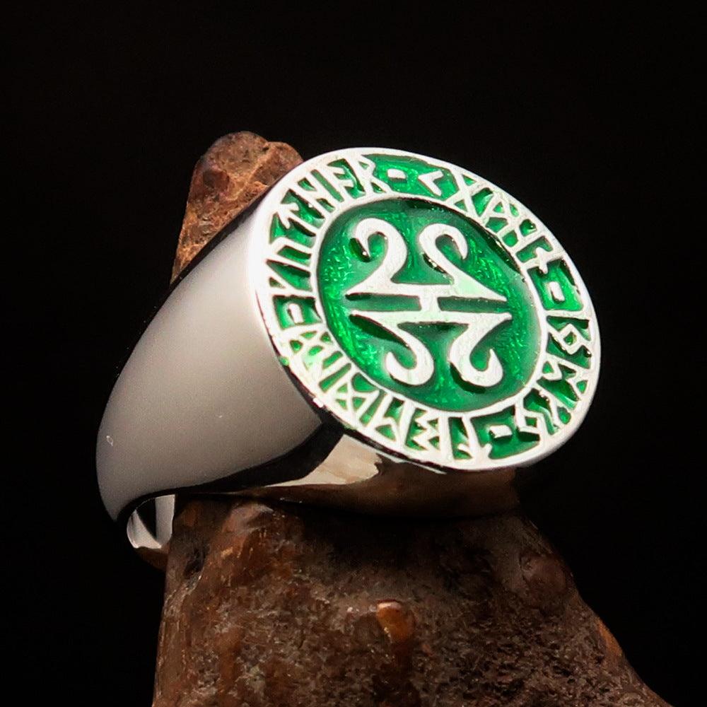 Men's ancient green Viking runes ring made of sterling silver with high polish and enamel finish, showcasing intricate rune designs.