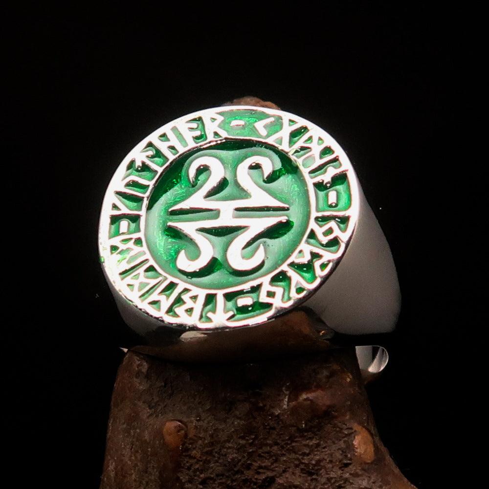 Men's ancient green Viking runes ring made of sterling silver with high polish and enamel finish, showcasing intricate rune designs.