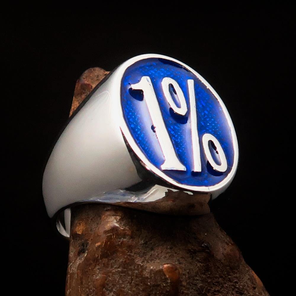 Men's Outlaw Ring made of solid sterling silver featuring a blue enamel 1% symbol, showcasing its high polish and detailed craftsmanship.