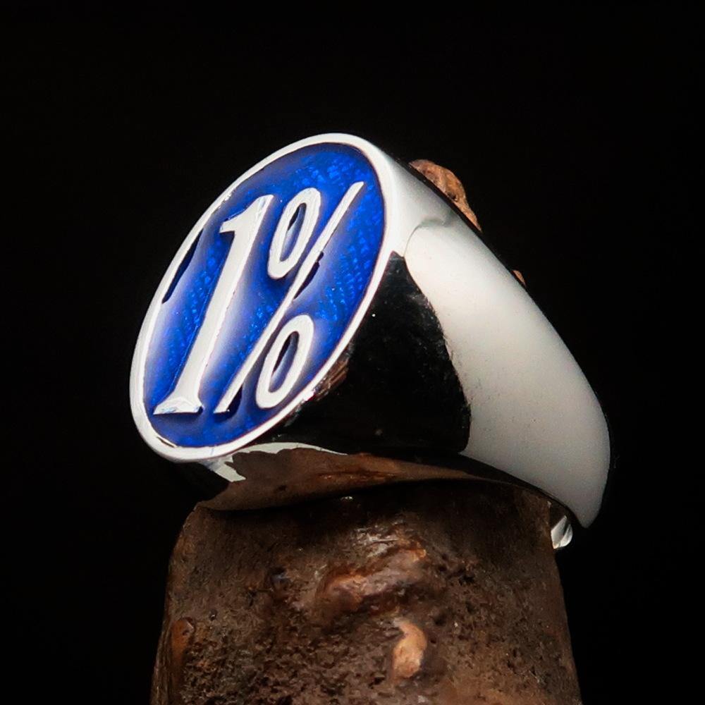 Men's Outlaw Ring made of solid sterling silver featuring a blue enamel 1% symbol, showcasing its high polish and detailed craftsmanship.