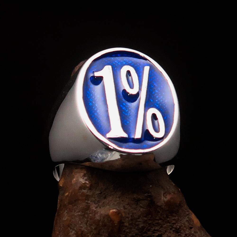 Men's Outlaw Ring made of solid sterling silver featuring a blue enamel 1% symbol, showcasing its high polish and detailed craftsmanship.