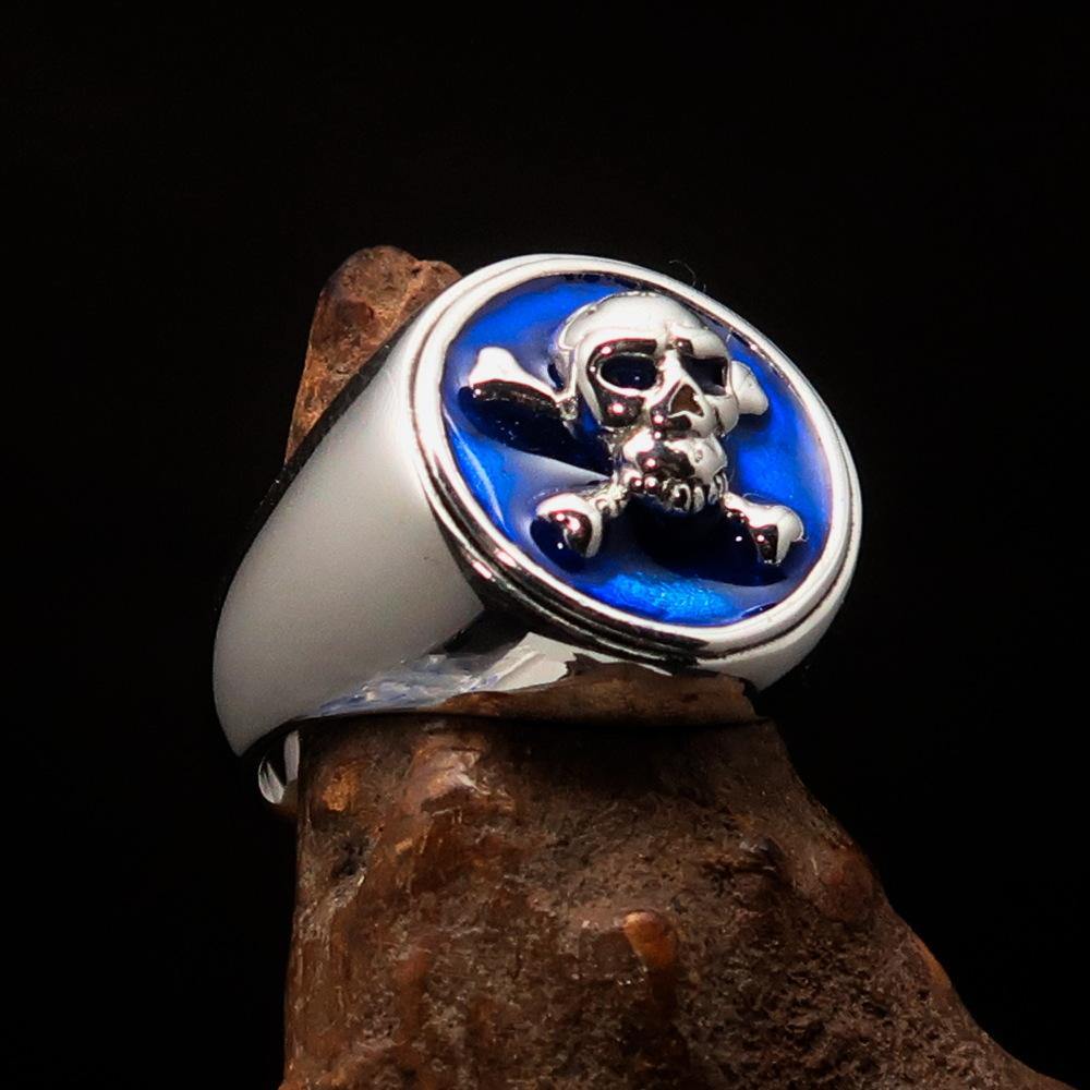 Men's Pirate Ring featuring Jolly Roger design with crossed bones and blue enamel, crafted from solid sterling silver.