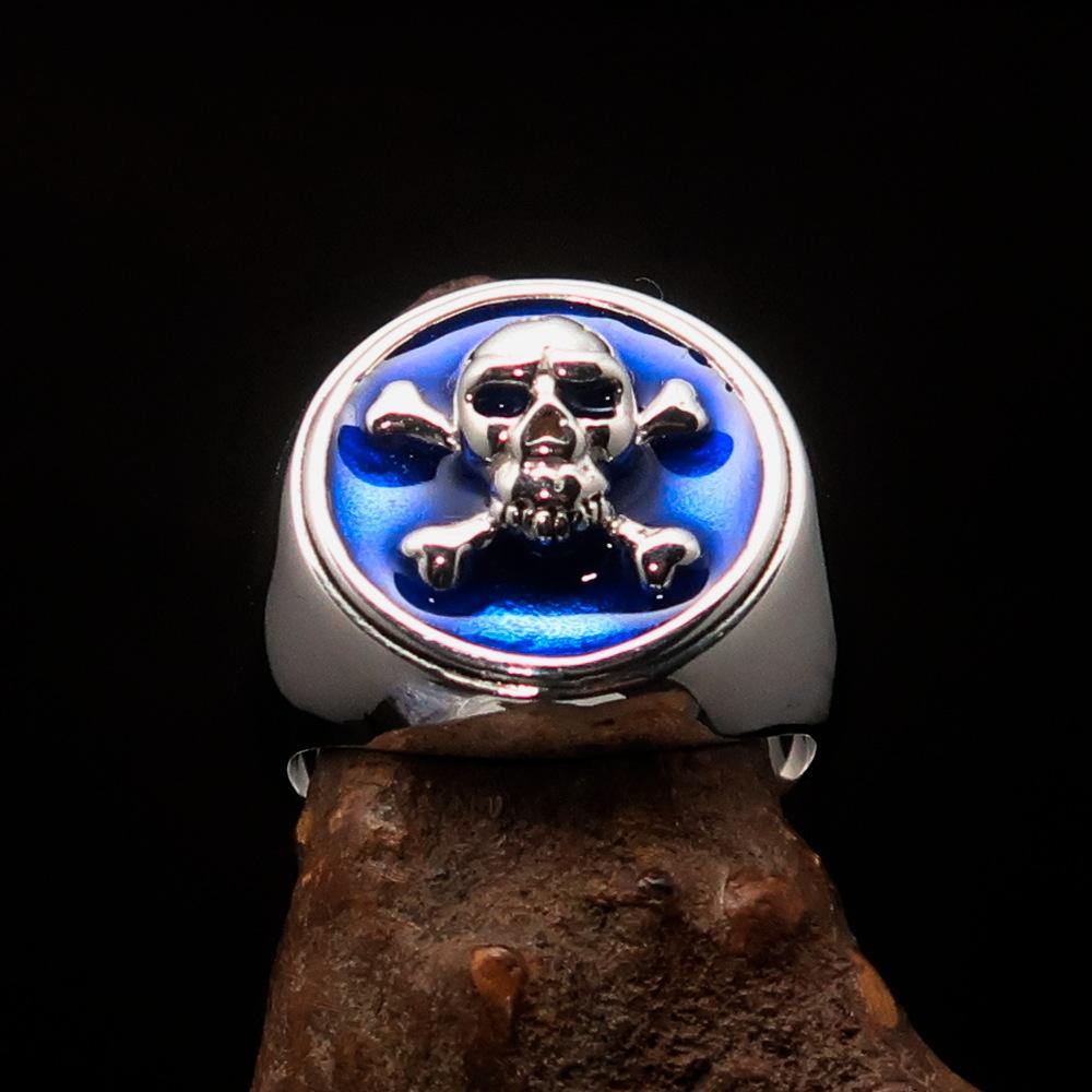 Men's Pirate Ring featuring Jolly Roger design with crossed bones and blue enamel, crafted from solid sterling silver.