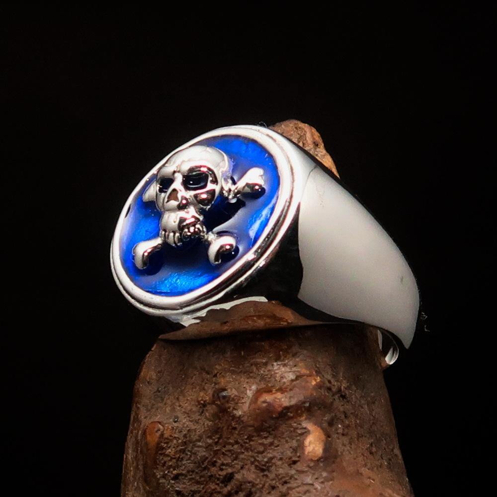 Men's Pirate Ring featuring Jolly Roger design with crossed bones and blue enamel, crafted from solid sterling silver.