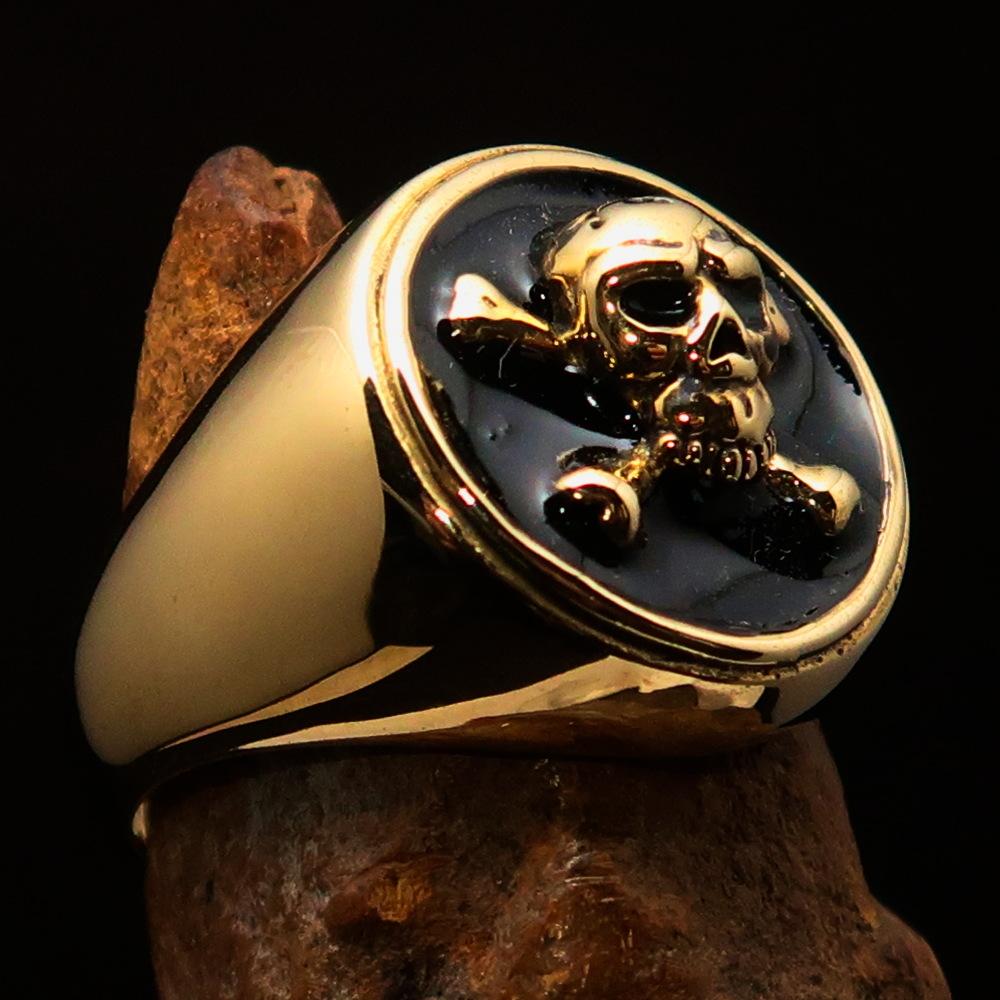 Men's Pirate Ring featuring Jolly Roger design with crossed bones and skull, crafted from solid brass with high polished black enamel finish.