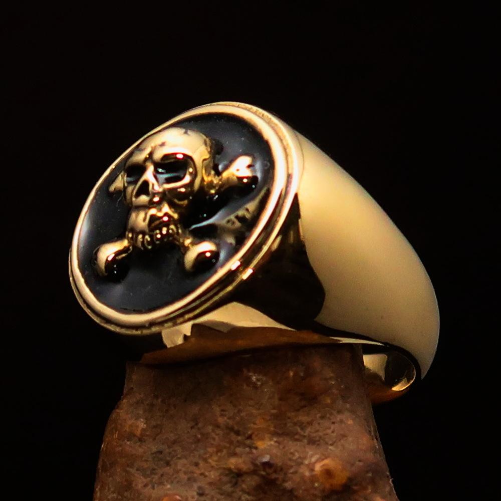 Men's Pirate Ring featuring Jolly Roger design with crossed bones and skull, crafted from solid brass with high polished black enamel finish.