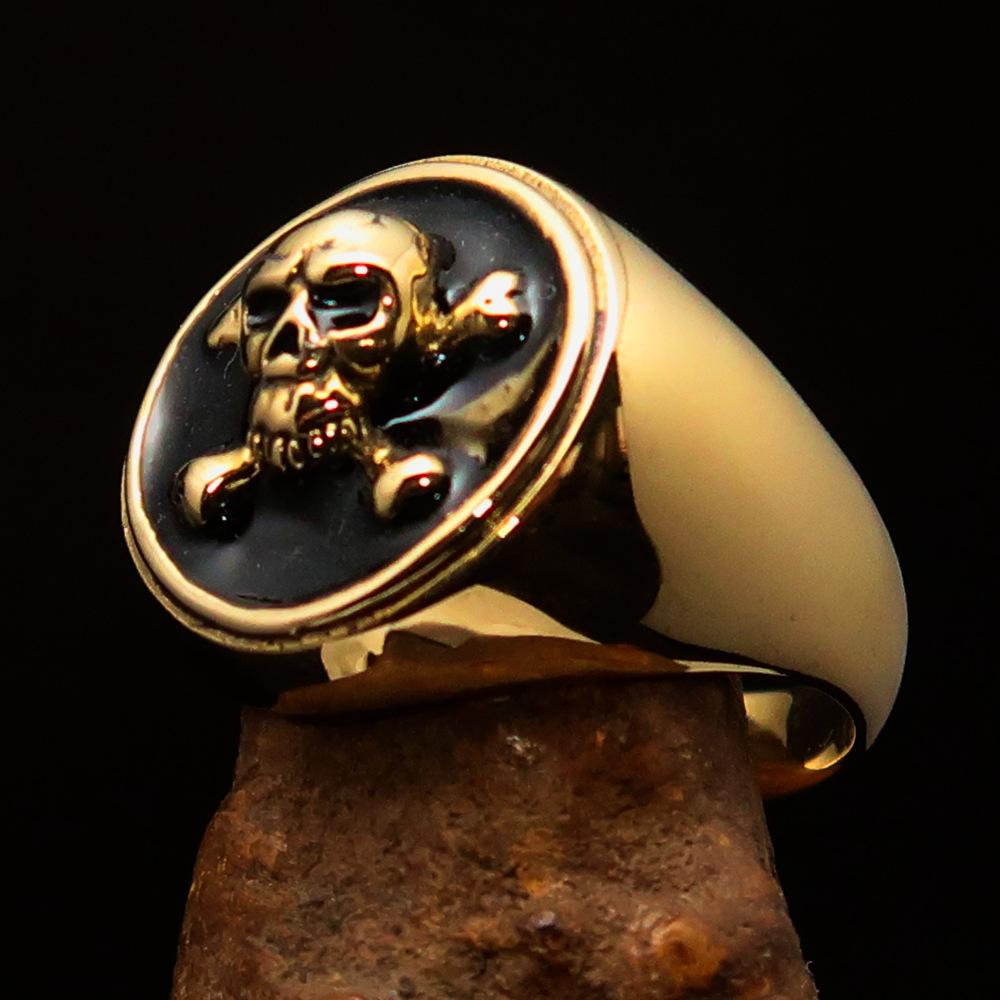 Men's Pirate Ring featuring Jolly Roger design with crossed bones and skull, crafted from solid brass with high polished black enamel finish.