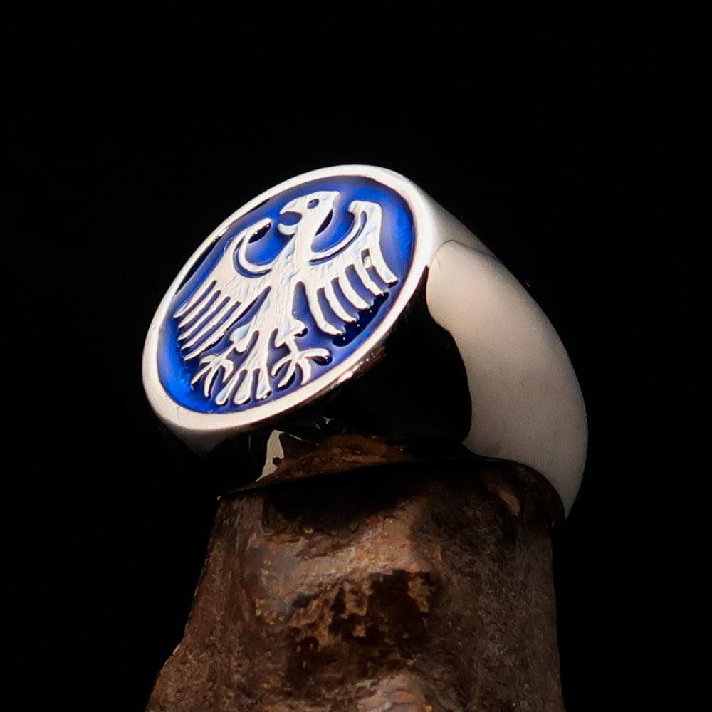 Men's Seal Ring in sterling silver featuring a blue German Eagle design, showcasing intricate craftsmanship and a polished finish.