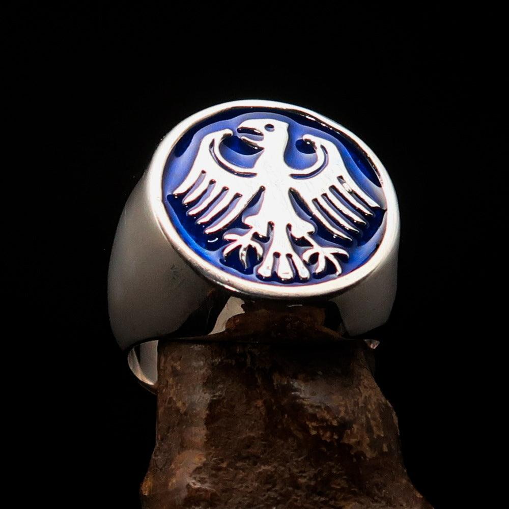 Men's Seal Ring in sterling silver featuring a blue German Eagle design, showcasing intricate craftsmanship and a polished finish.