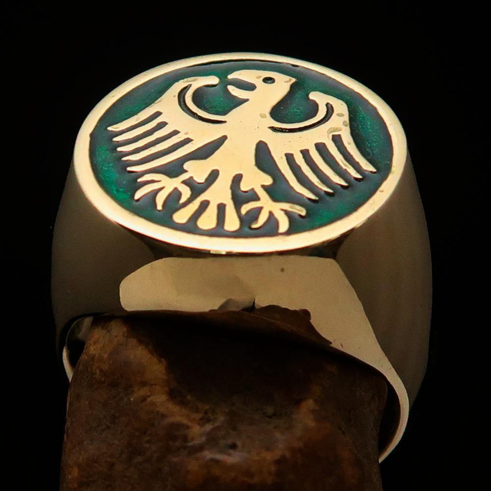 Men's Seal Ring made of solid brass featuring the German Eagle design with green enamel accents, showcasing intricate craftsmanship.