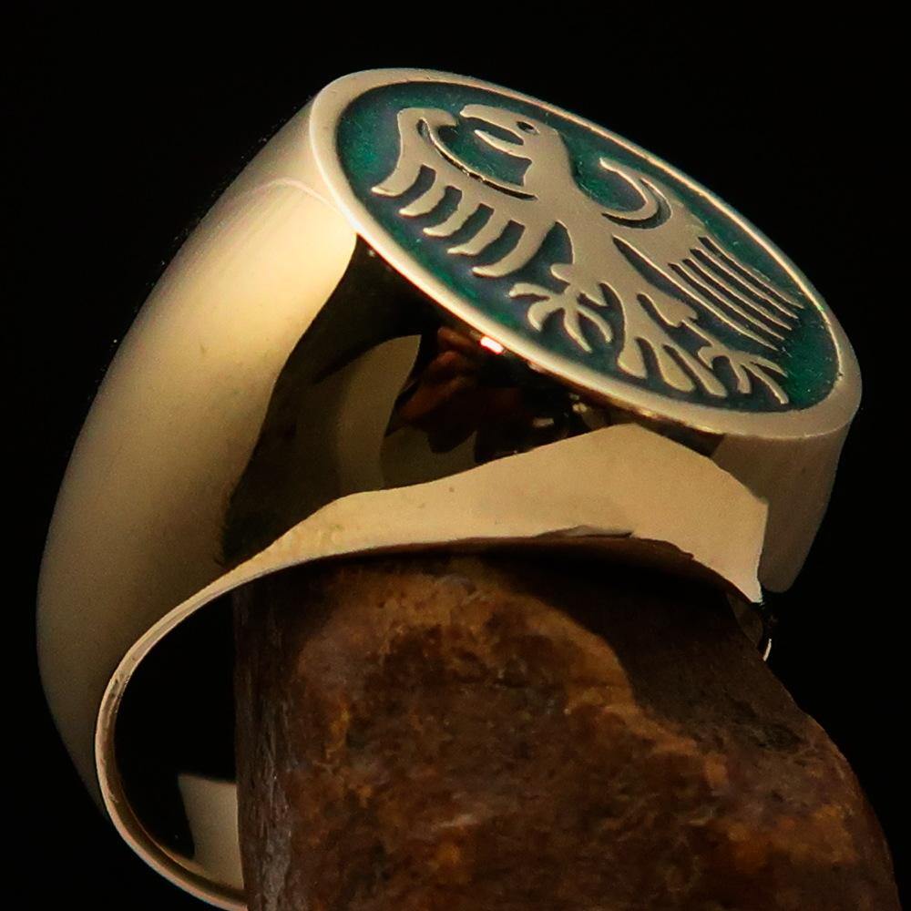 Men's Seal Ring made of solid brass featuring the German Eagle design with green enamel accents, showcasing intricate craftsmanship.