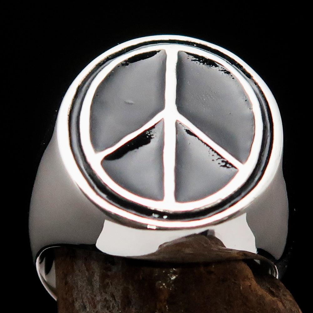 Oval Men's Ring in Sterling Silver featuring a black Peace Symbol, showcasing high polish and elegant design.