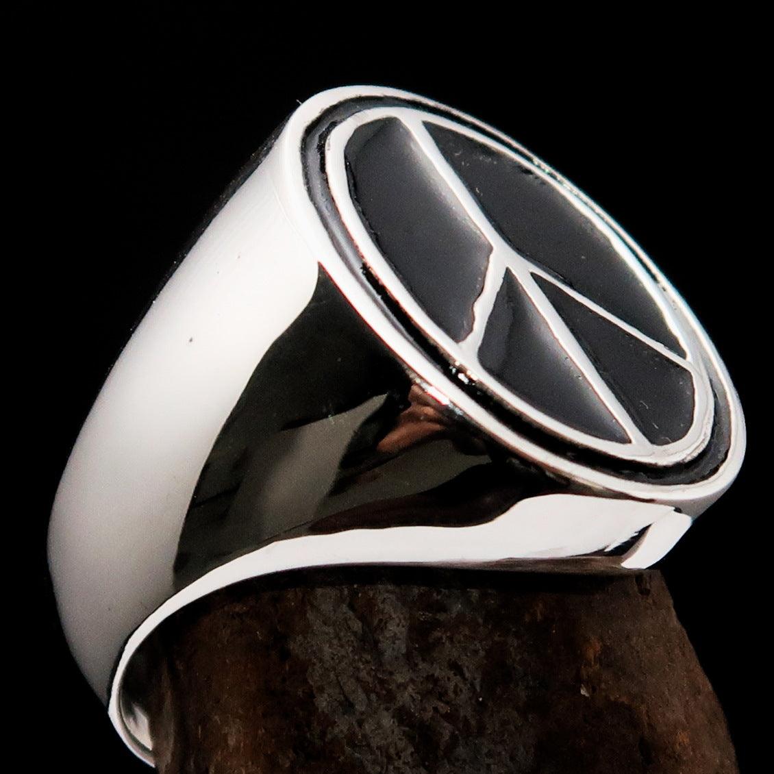 Oval Men's Ring in Sterling Silver featuring a black Peace Symbol, showcasing high polish and elegant design.