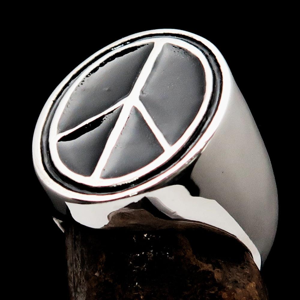 Oval Men's Ring in Sterling Silver featuring a black Peace Symbol, showcasing high polish and elegant design.