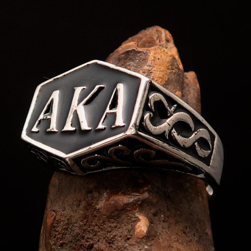 A stylish black enamel Synonym Men's Ring made of solid sterling silver, featuring a high-polished finish and a solid back.