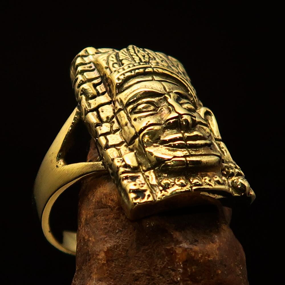 A beautifully crafted brass men's Buddha ring inspired by Bayon Angkor Wat, featuring a high polished and antiqued finish.