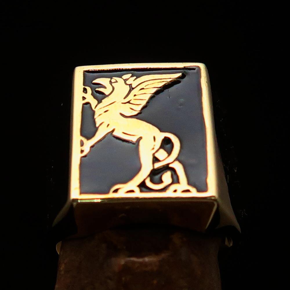 Men's Black Griffin Ring Griffon made of solid brass with a polished finish and black enamel, showcasing a griffon design.