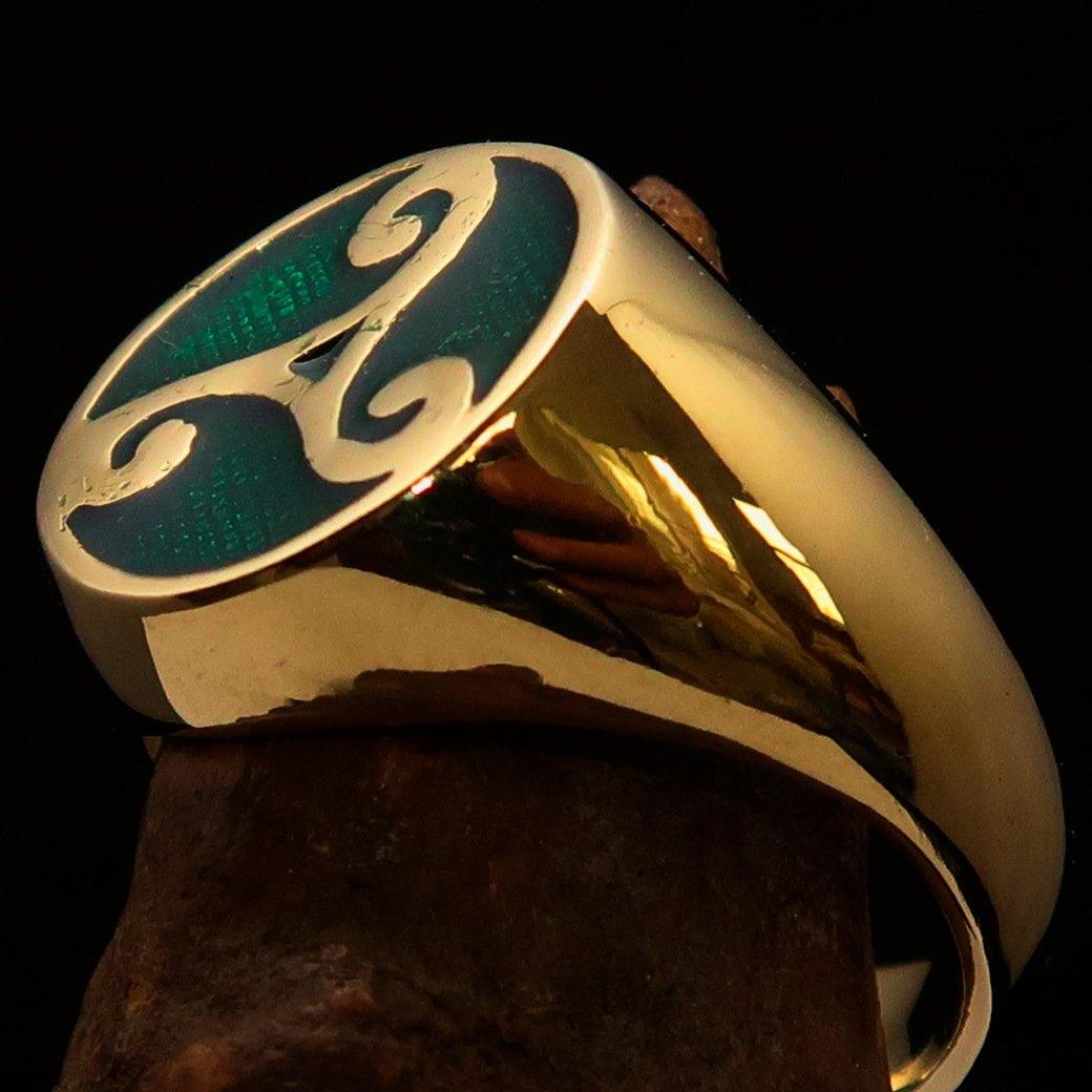 Men's Celtic Triade Ring featuring a green Triskele design, crafted from solid brass with a high-polished finish.