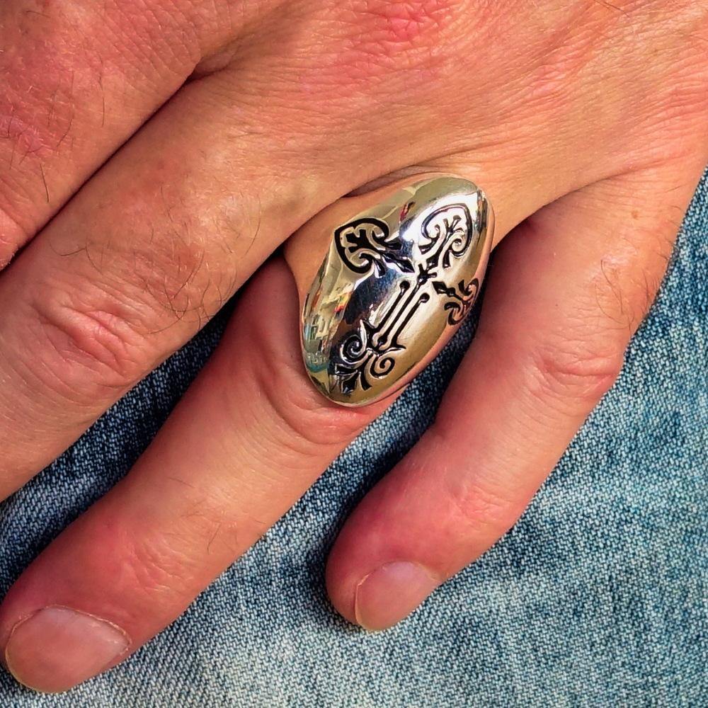 Men's Coptic Cross Ring made of solid sterling silver with black enamel, showcasing a high-polished finish and unique design.