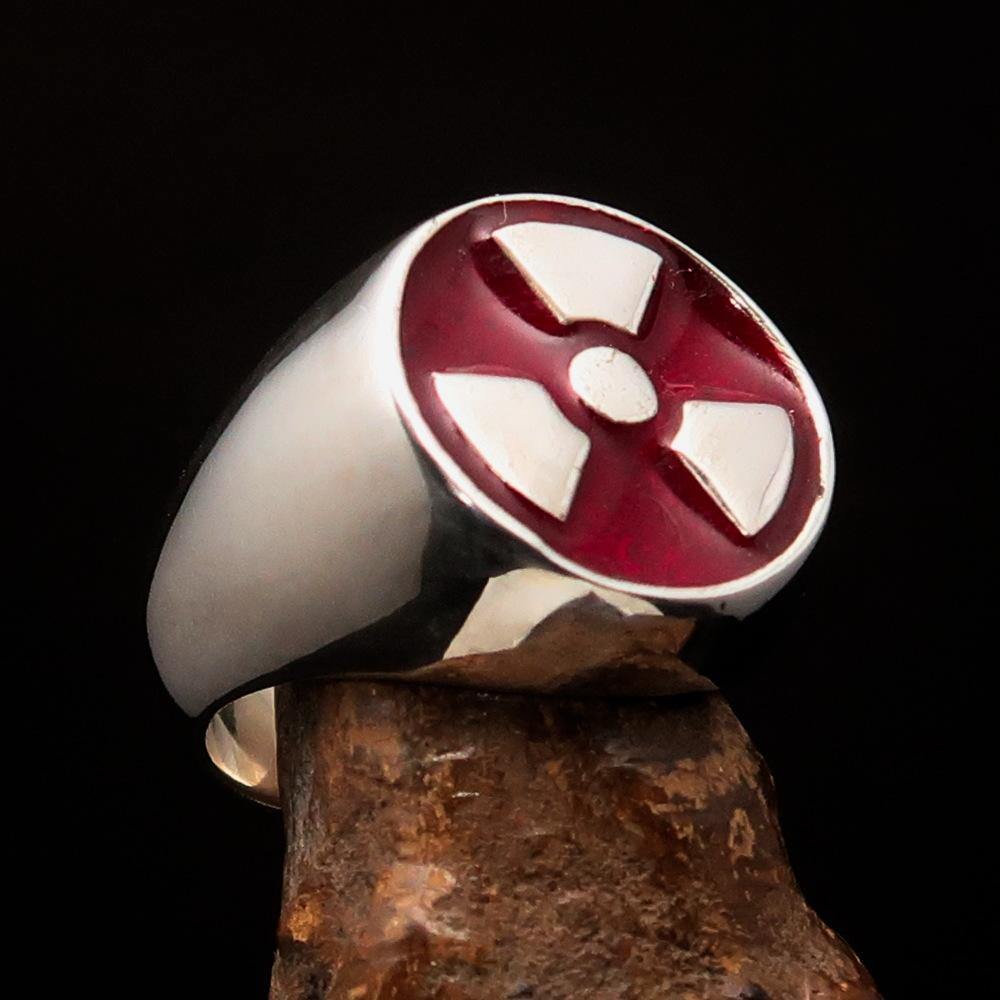 Men's Gamer Ring in sterling silver featuring a red enamel radioactive symbol, showcasing its polished finish and unique design.