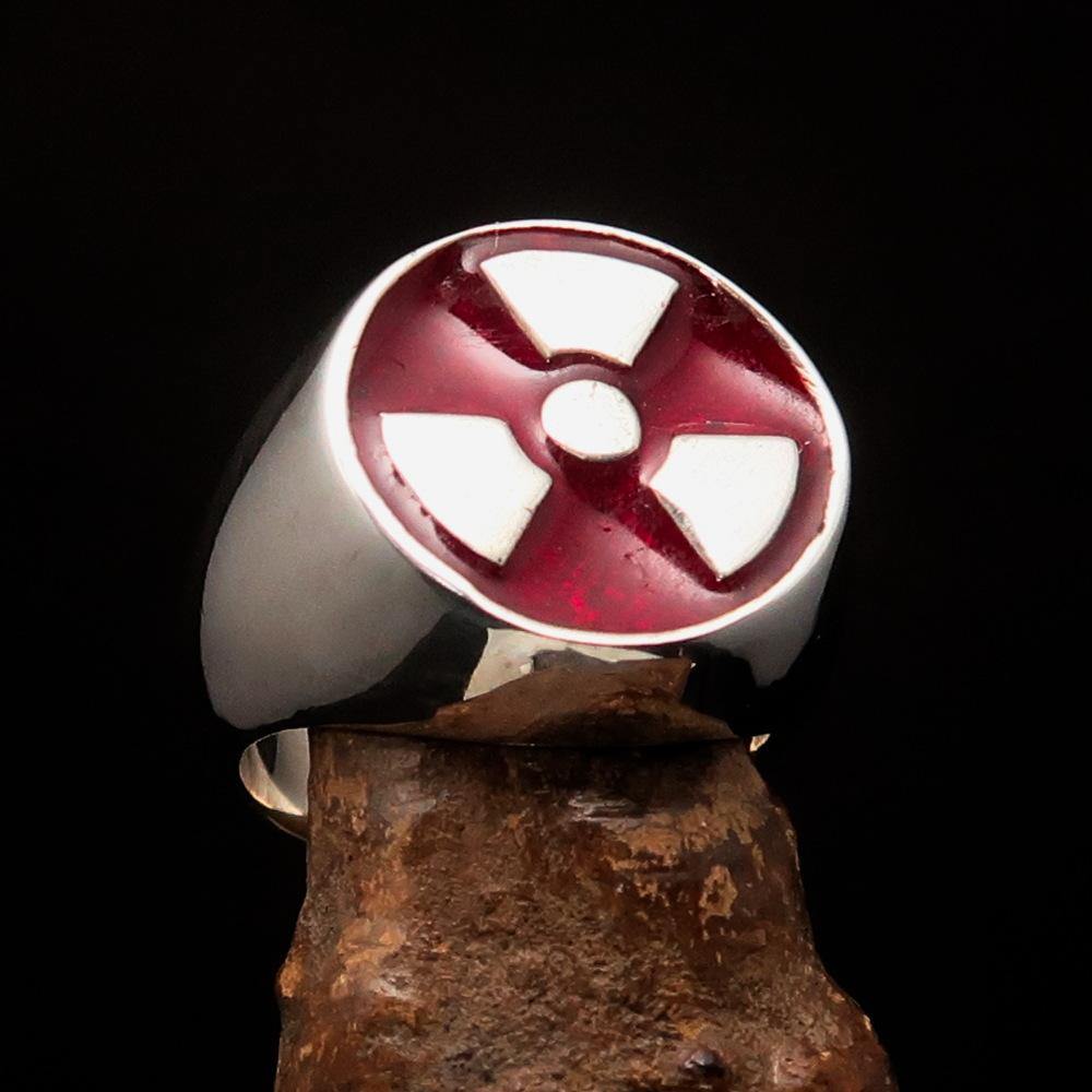 Men's Gamer Ring in sterling silver featuring a red enamel radioactive symbol, showcasing its polished finish and unique design.