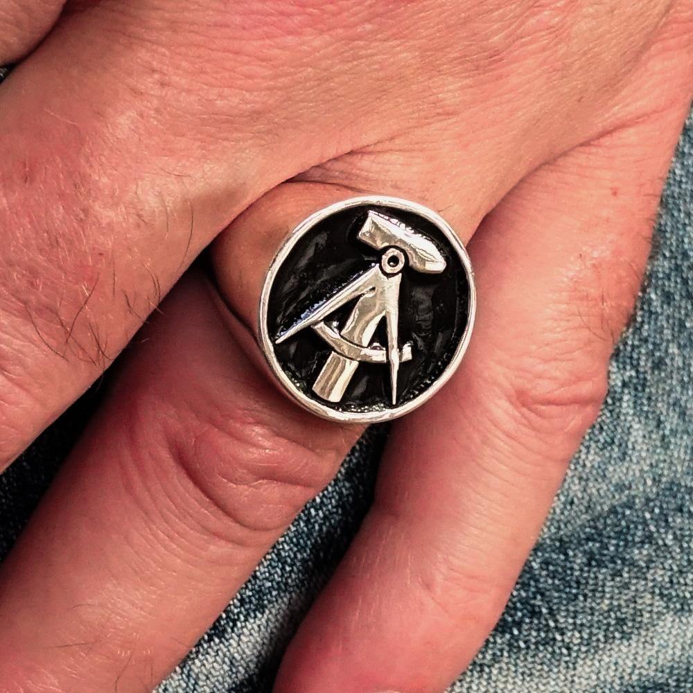 Men's GDR Socialist Ring Hammer Compasses in solid sterling silver with black enamel finish, showcasing intricate crest design.