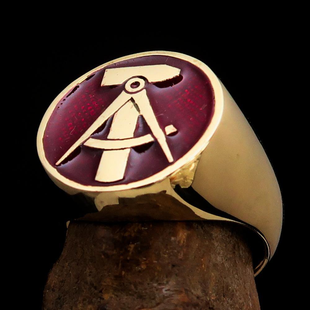 Men's GDR Socialist Ring Hammer Compass made of solid brass with a high-polished finish and vibrant red enamel.