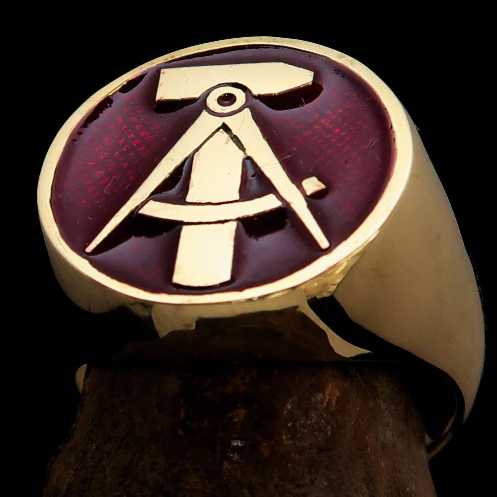 Men's GDR Socialist Ring Hammer Compass made of solid brass with a high-polished finish and vibrant red enamel.