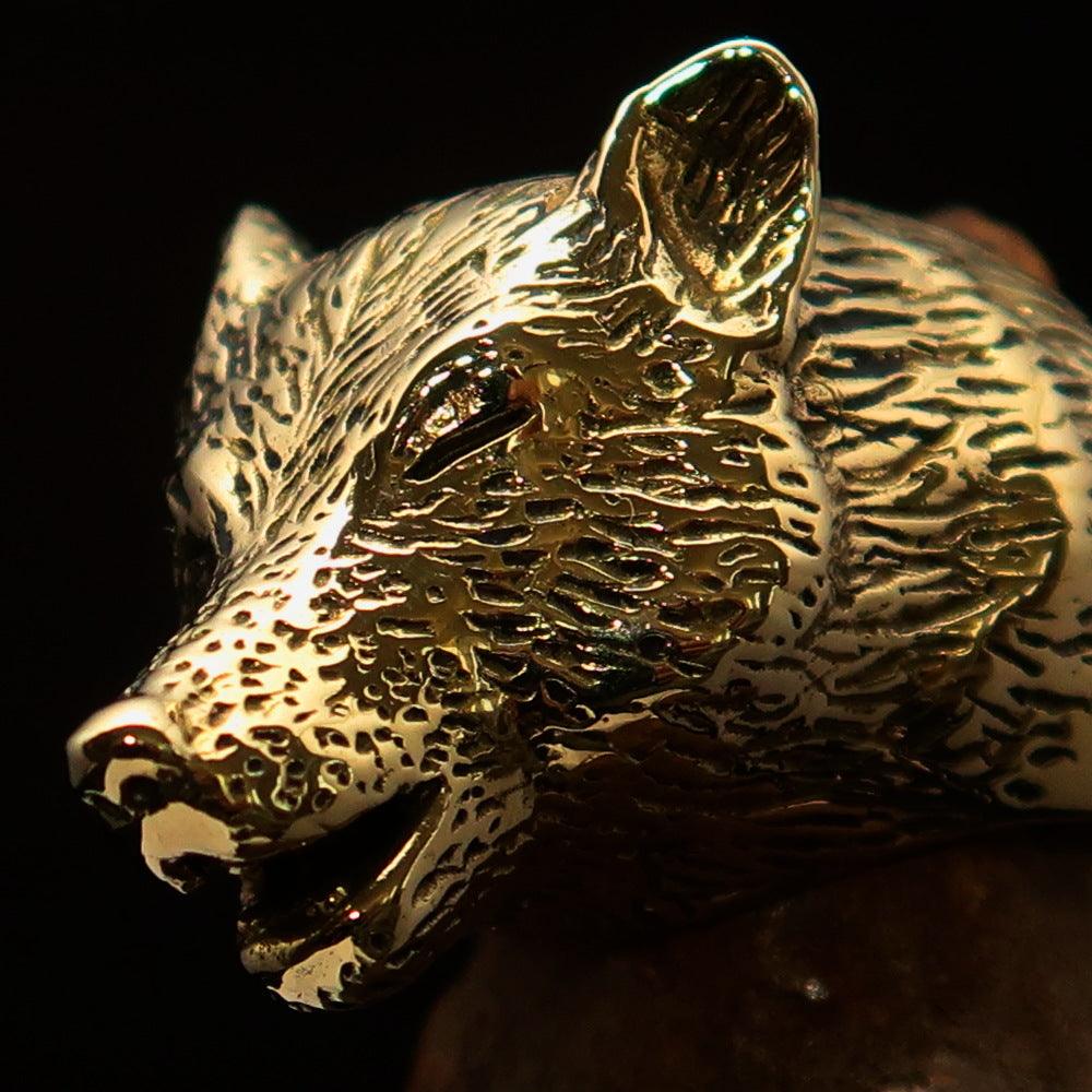 Men's Howling Wolf Pinky Ring in antiqued brass with intricate detailing and a vintage finish.