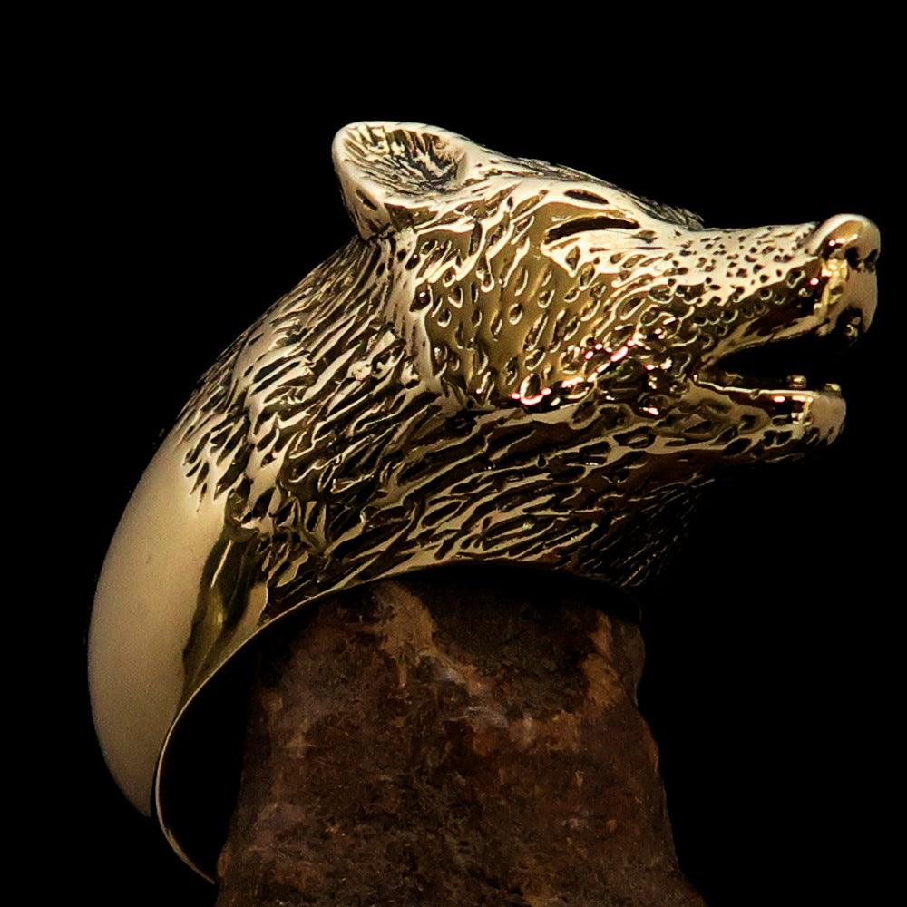 Men's Howling Wolf Pinky Ring in antiqued brass with intricate detailing and a vintage finish.