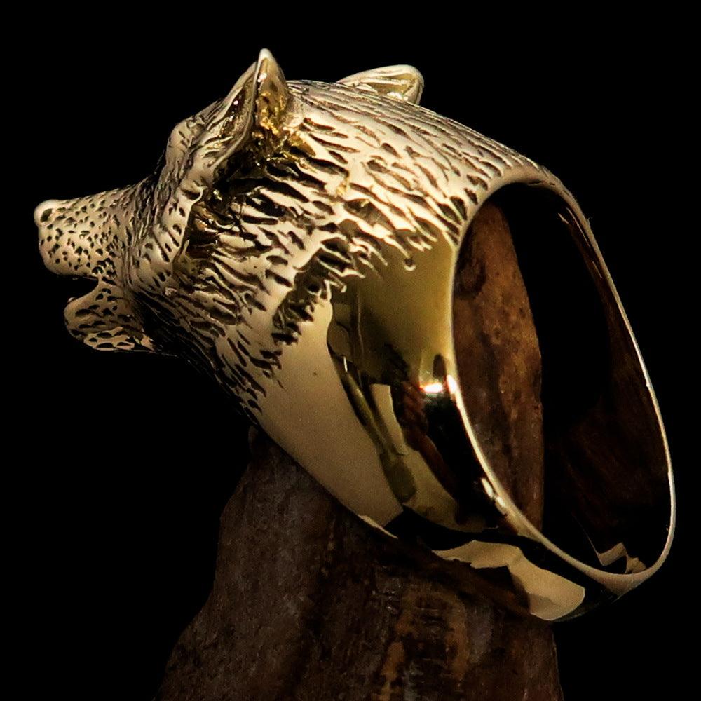 Men's Howling Wolf Pinky Ring in antiqued brass with intricate detailing and a vintage finish.